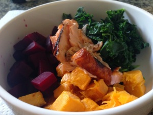 broiled salmon over roasted beets, butternut squash, and braised kale